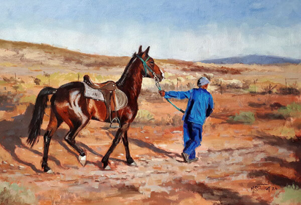 Man leading horse